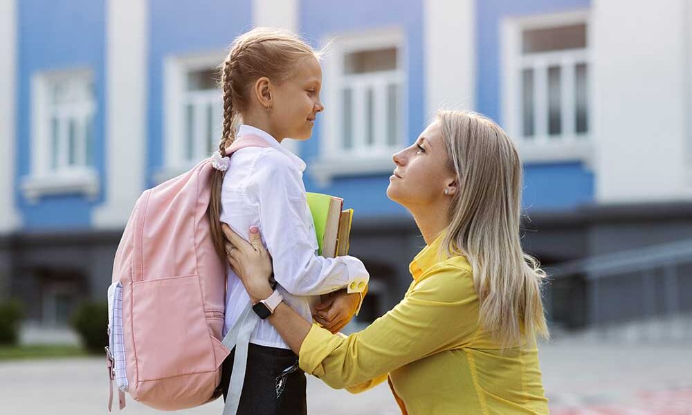 Simple back-to-school checklist for kids - a mom and a school child