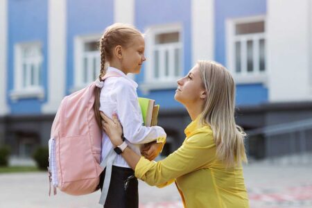 Simple back-to-school checklist for kids - a mom and a school child